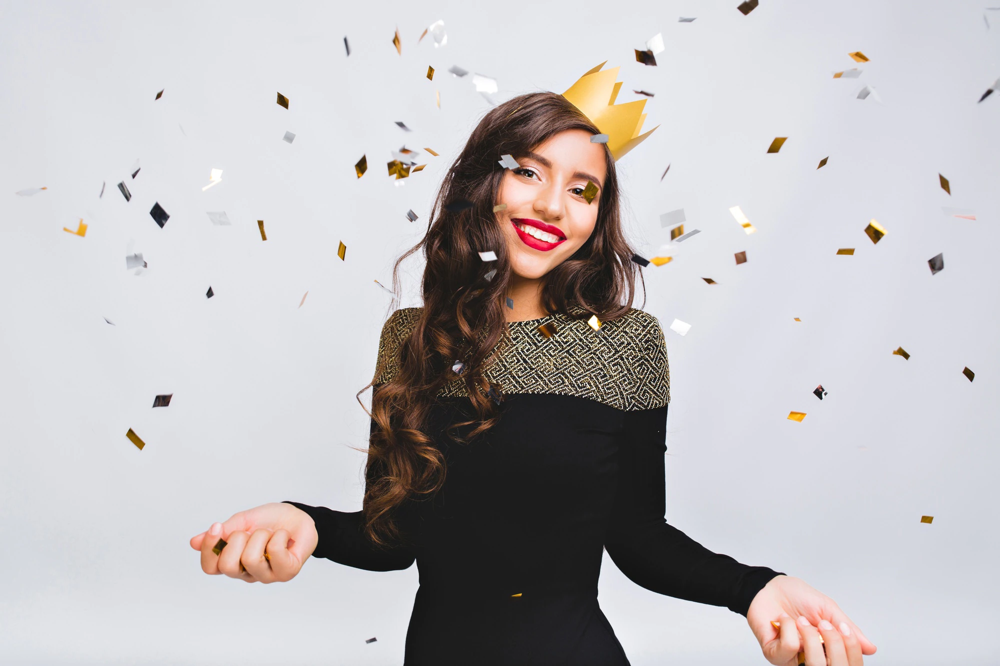 happy time young smiling woman celebrating new year wearing black dress and yellow crown happy carnival disco party sparkling confetti having fun smiling 197531 1346