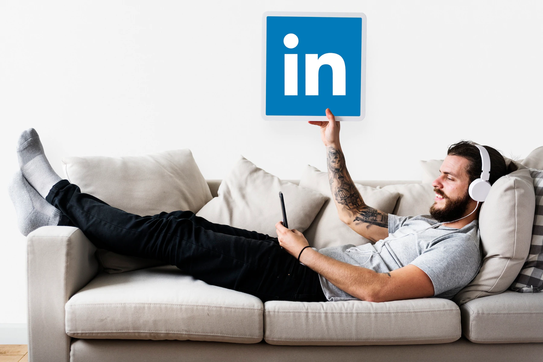person holding a linkedin icon 53876 41292