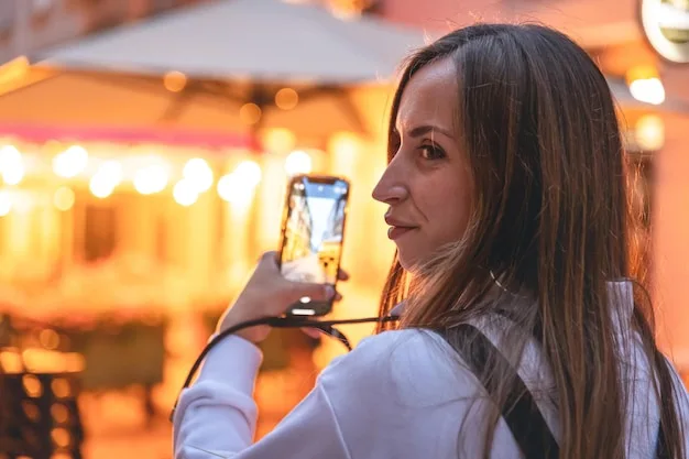 young woman photographs night city smartphone 169016 22190 1