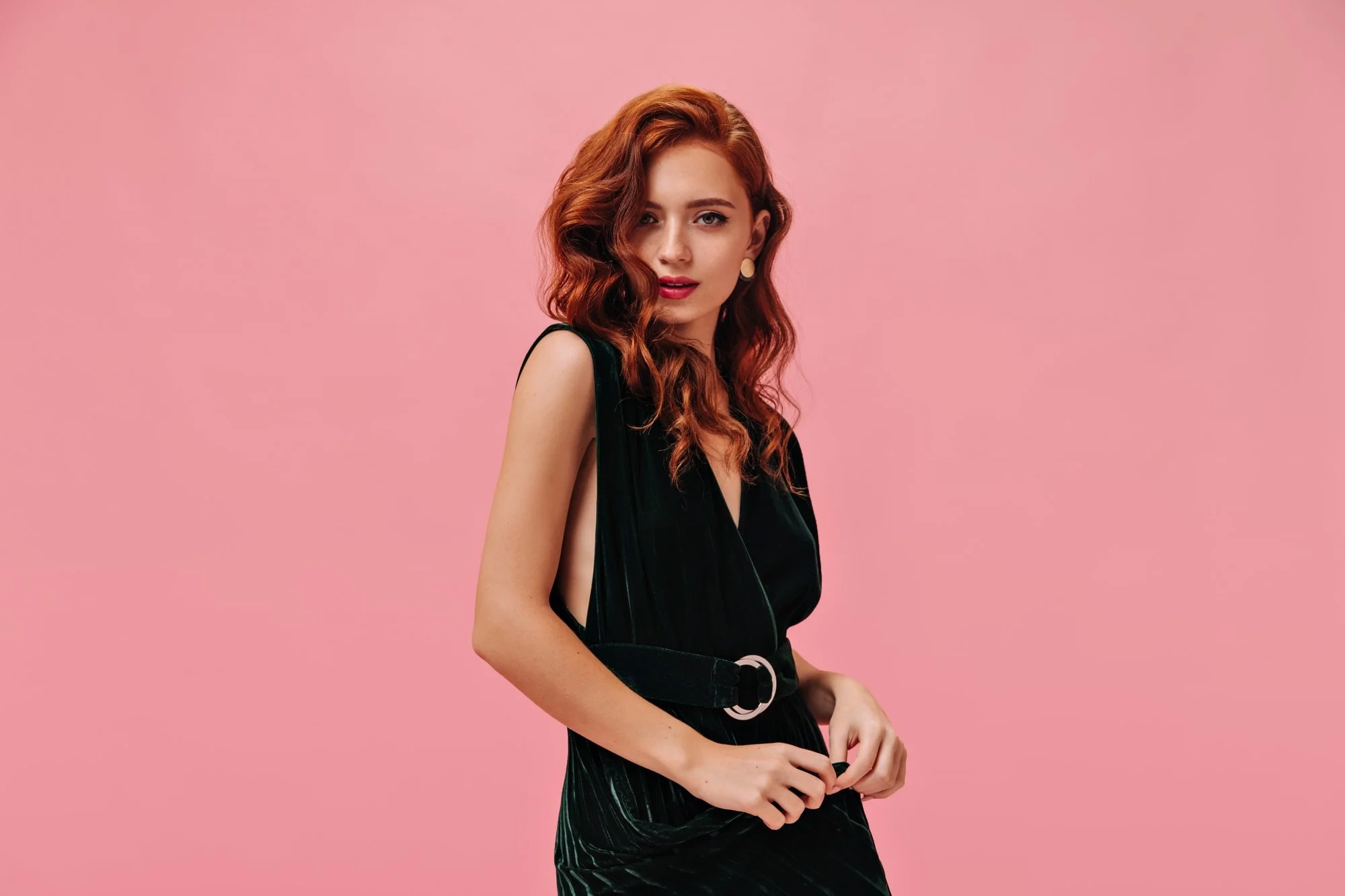 attractive woman dark dress looks front pink wall 197531 23819