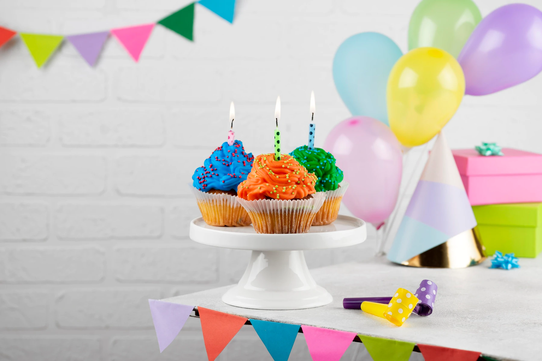 colorful birthday party cupcakes with candles 23 2149023529