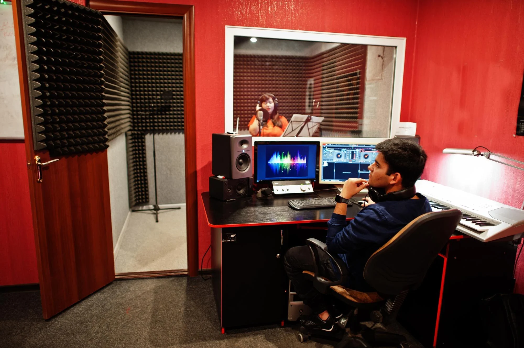 young asian singer with microphone recording song record music studio with sound producer 627829 3666